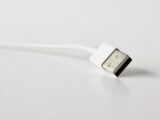A detailed close-up image of a USB cable, perfect for technology-related projects.