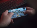 person holding black samsung android smartphone
