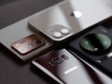 a group of cell phones sitting on top of a table