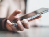 person holding black smartphone
