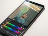 black Android smartphone on white surface